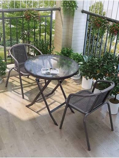 mesa de exterior de cristal